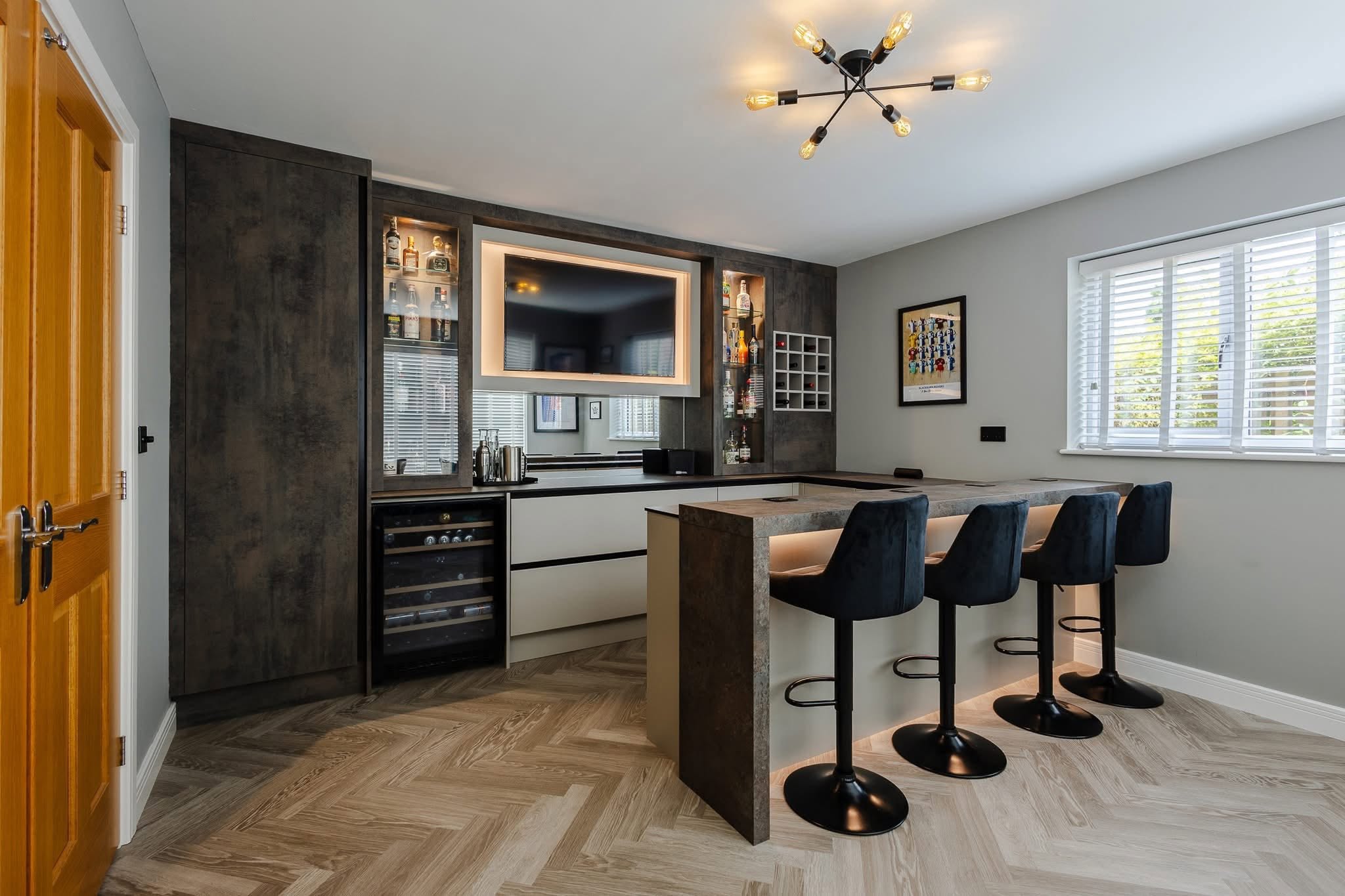 Bespoke home bar and entertainment room by CJS Interiors